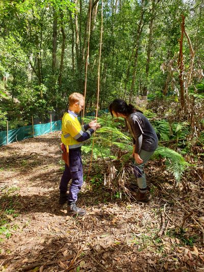 Pierre showing Jeanna the data loggers used to monitor the reserve